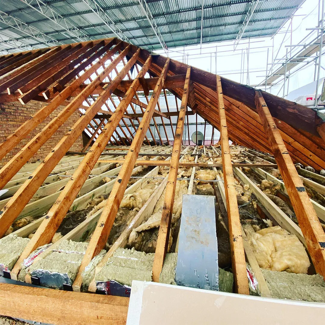 A roof that is being constructed with wood.
